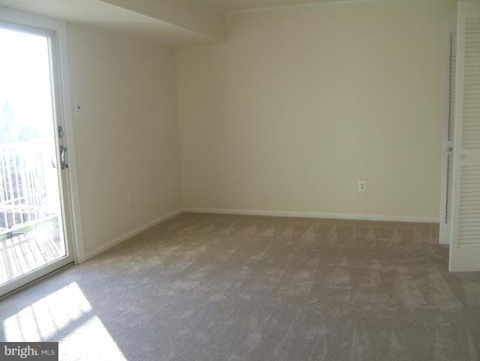 14507 Golden Oak Road Centreville, VA 20121 - Photo 3 of 12 an empty room with a window