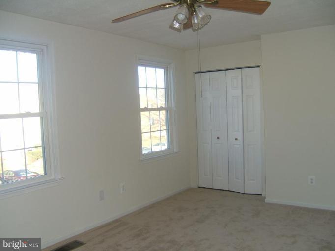 14507 Golden Oak Road Centreville, VA 20121 - Photo 7 of 12 an empty room with a window