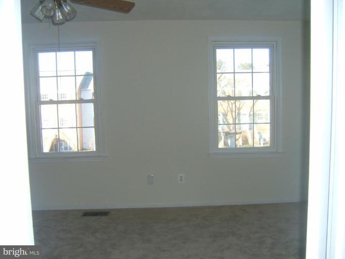 14507 Golden Oak Road Centreville, VA 20121 - Photo 8 of 12 an empty room with a window