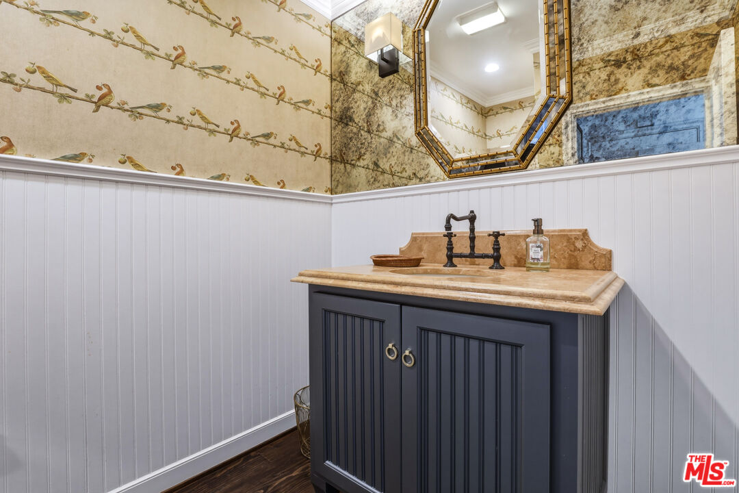 30810 Broad Beach Road Malibu, CA 90265 - Photo 47 of 55 a bathroom with a sink and a mirror