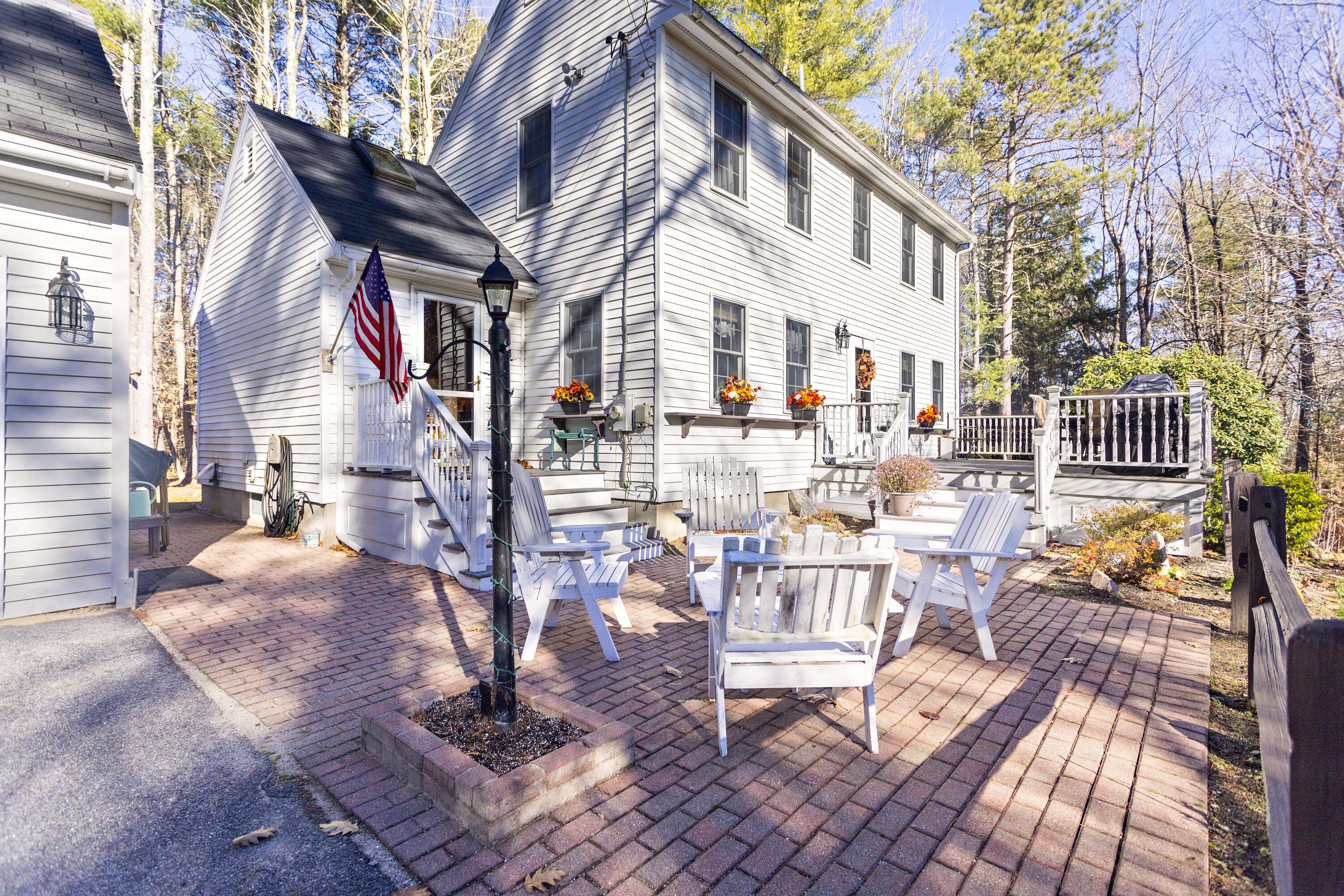 285 Yarmouth Road Gray, ME 04039 - Photo 26 of 29 Front of house with brick patio