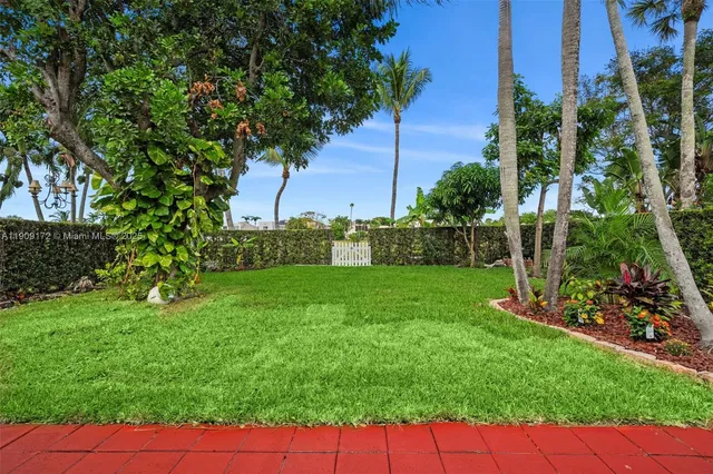 an aerial view of a house with a lake view