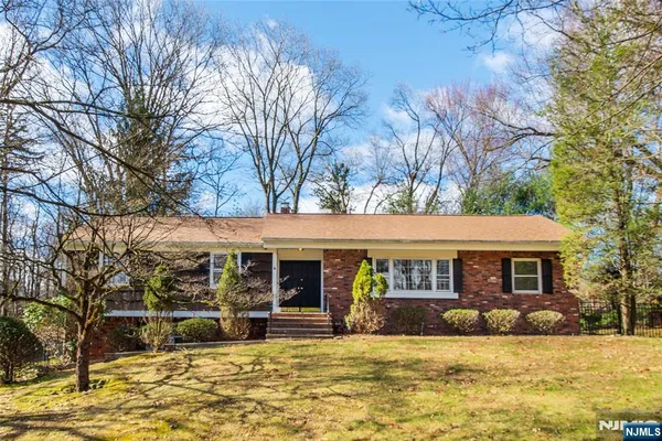 a view of a house with a swimming pool
