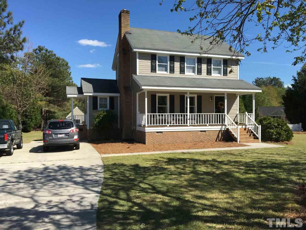 10101 Joe Leach Road Raleigh, NC 27603 - Photo 1 of 15 a view of a house with a swimming pool