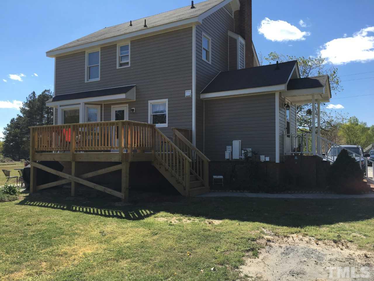 10101 Joe Leach Road Raleigh, NC 27603 - Photo 2 of 15 a view of a house with a yard