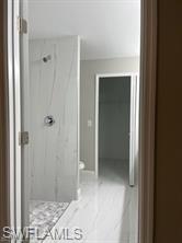 3880 Lora Street Fort Myers, FL 33916 - Photo 3 of 6 a view of a bathroom with a shower