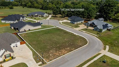 a bathroom with a tub and shower