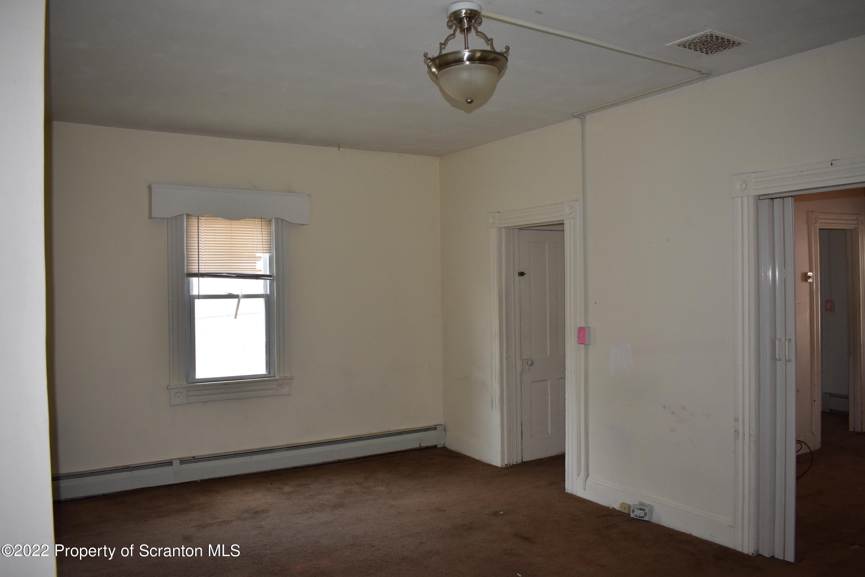 315 Aswell Court Scranton, PA 18504 - Photo 5 of 15 a view of empty room with windows