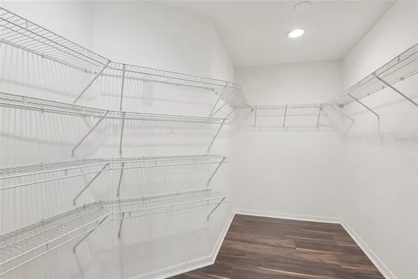 a view of a room with racks on the wall