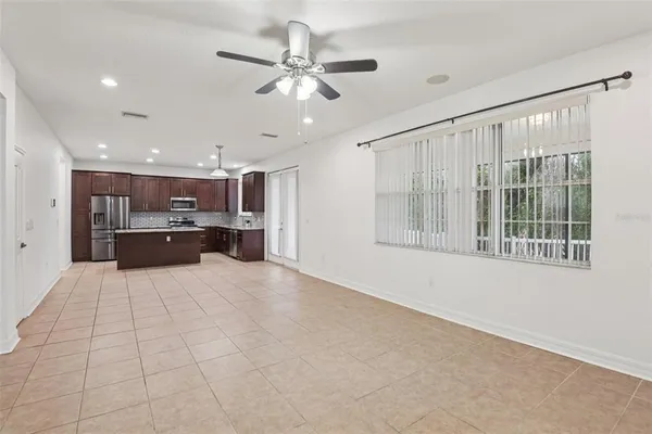 a view of kitchen with furniture and window