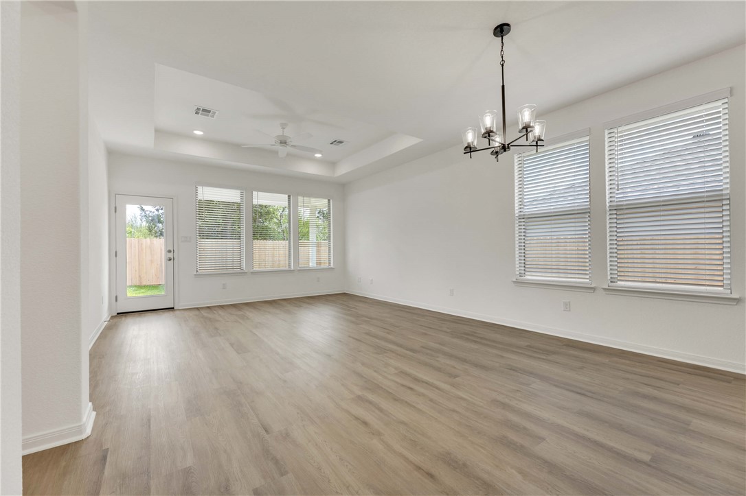 2776 Messenger Way Bryan, TX 77803 - Photo 8 of 16 a view of empty room with wooden floor and fan