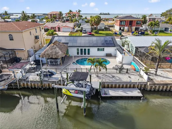 a view of a lake with a house
