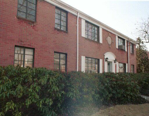 241 Seaton Road, Unit 2 Stamford, CT 06902 - Photo 1 of 1 a front view of a house with yard and green space