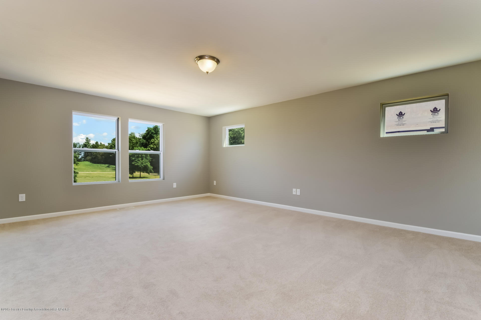 960 Pennine Ridge Way Grand Ledge, MI 48837 - Photo 8 of 21 Living Room MDE017-E2070-2