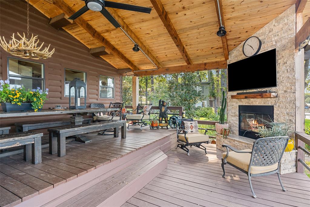 309 Shore Line Drive Tool, TX 75143 - Photo 18 of 23 a living room with patio furniture and a fireplace