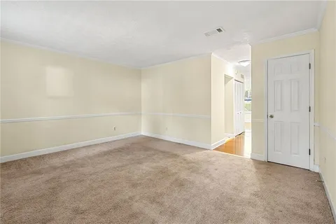 a view of storage and utility room with washer and dryer