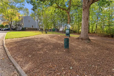 a view of swimming pool with a yard