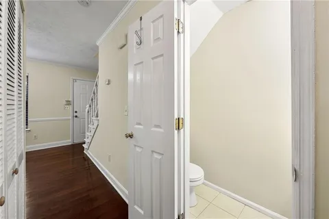 a bathroom with a granite countertop shower curtain and a sink