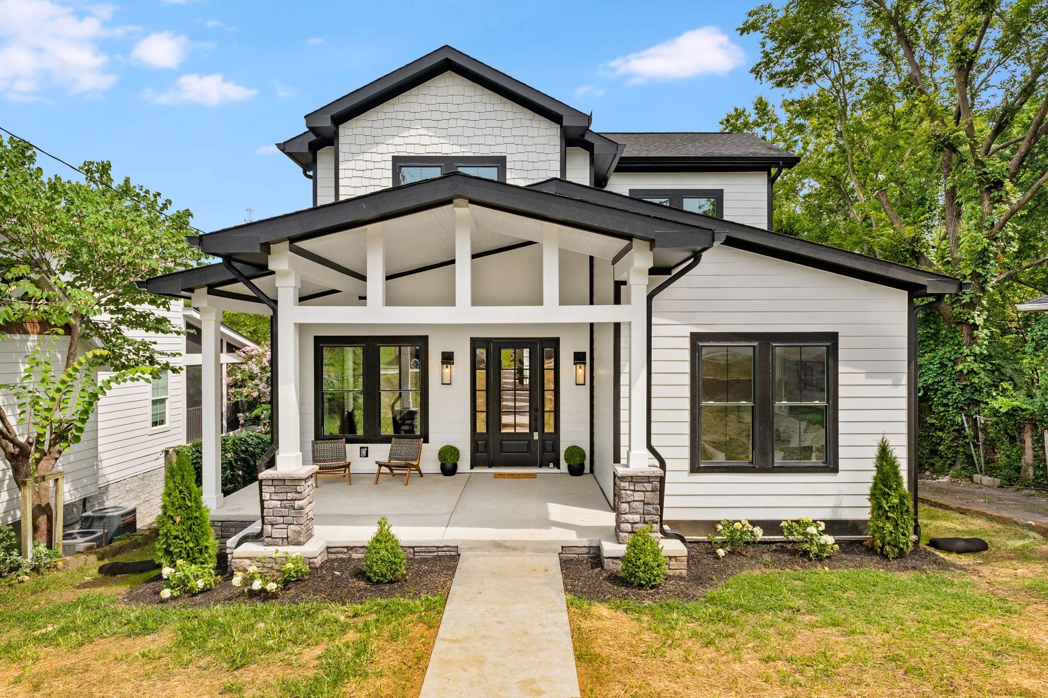 3512 Elkins Avenue Nashville, TN 37209 - Photo 1 of 36 a front view of a house with a yard