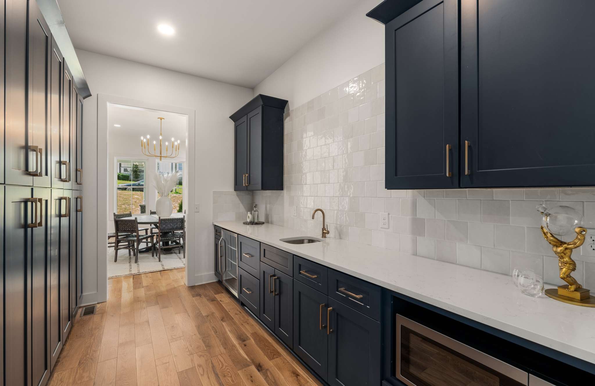 3512 Elkins Avenue Nashville, TN 37209 - Photo 14 of 36 a kitchen with stainless steel appliances a sink stove and cabinets