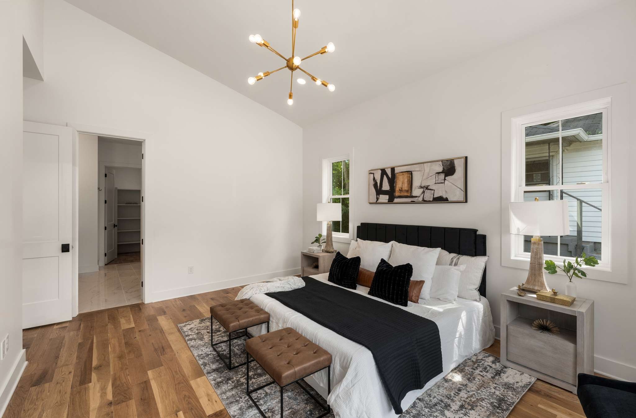 3512 Elkins Avenue Nashville, TN 37209 - Photo 18 of 36 a bedroom with a bed and wooden floor