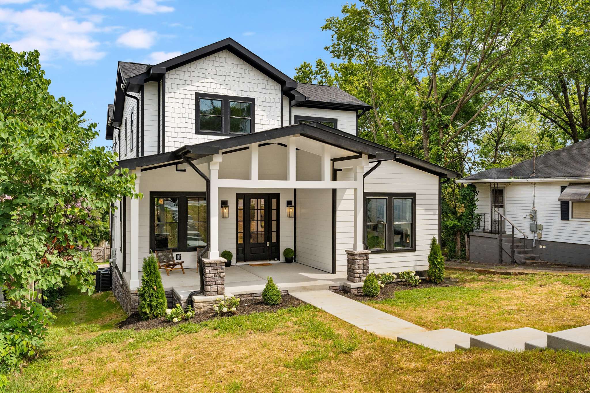 3512 Elkins Avenue Nashville, TN 37209 - Photo 2 of 36 a front view of house with yard outdoor seating and barbeque oven