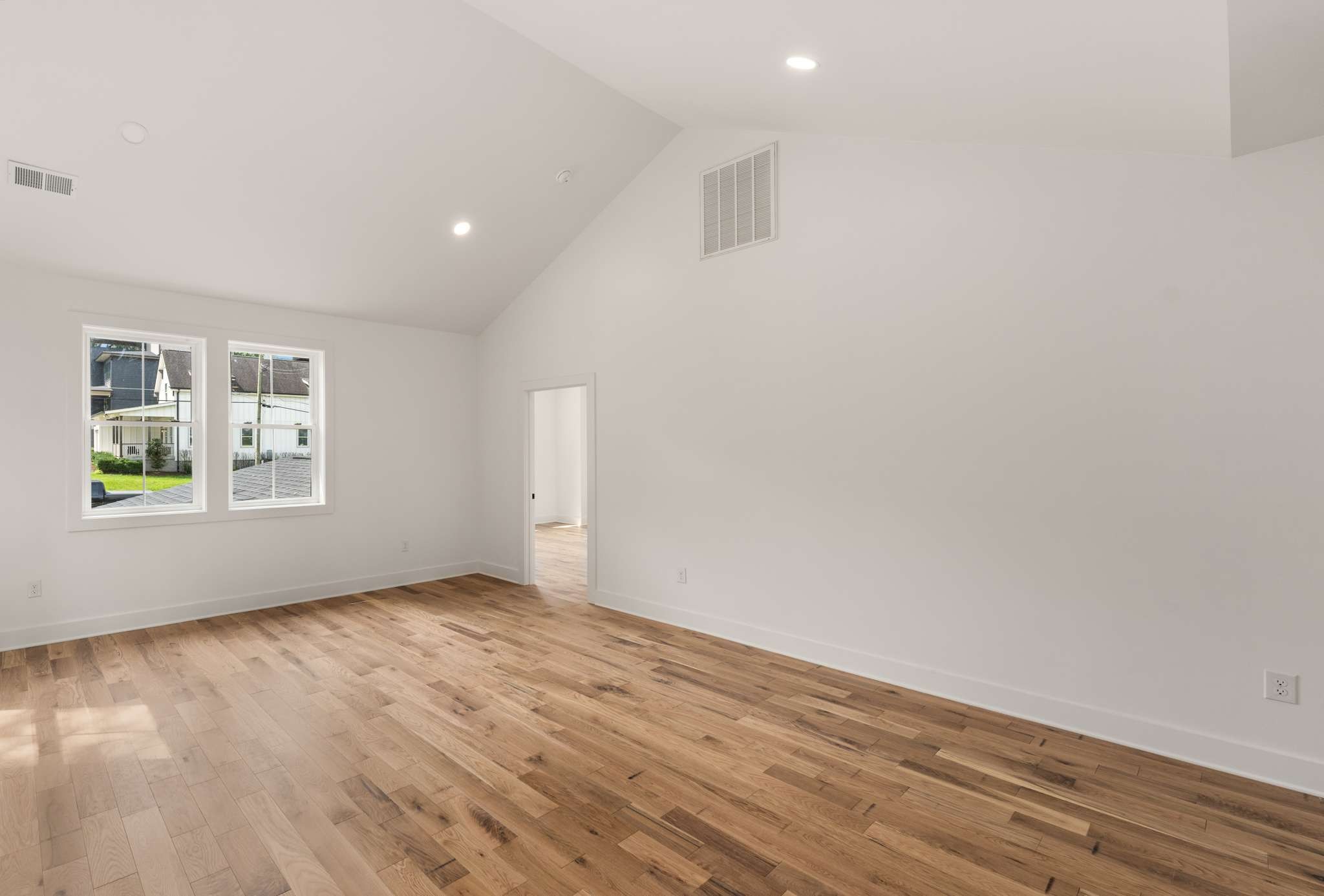 3512 Elkins Avenue Nashville, TN 37209 - Photo 25 of 36 an empty room with wooden floor and windows