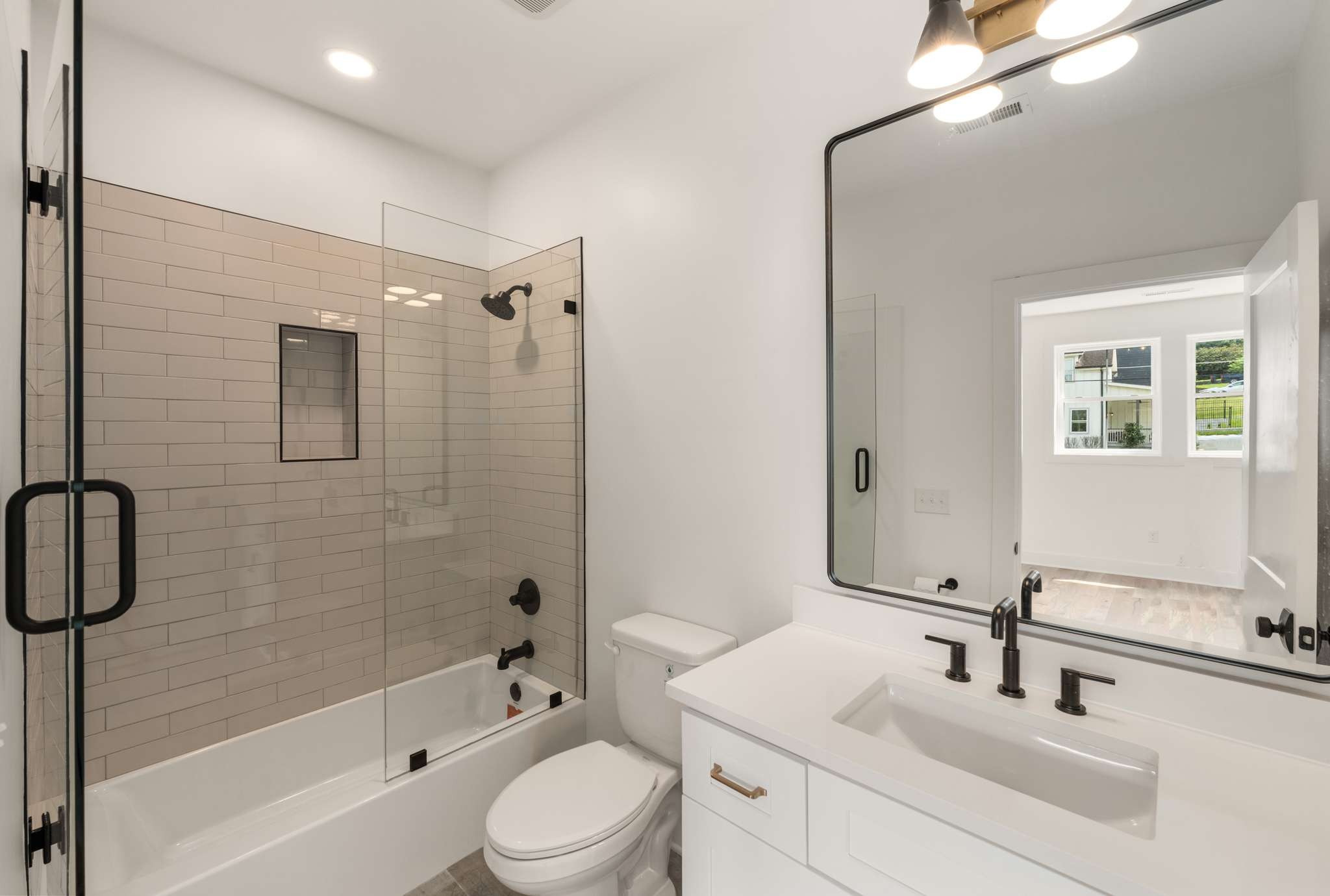3512 Elkins Avenue Nashville, TN 37209 - Photo 29 of 36 a bathroom with a sink a toilet and shower