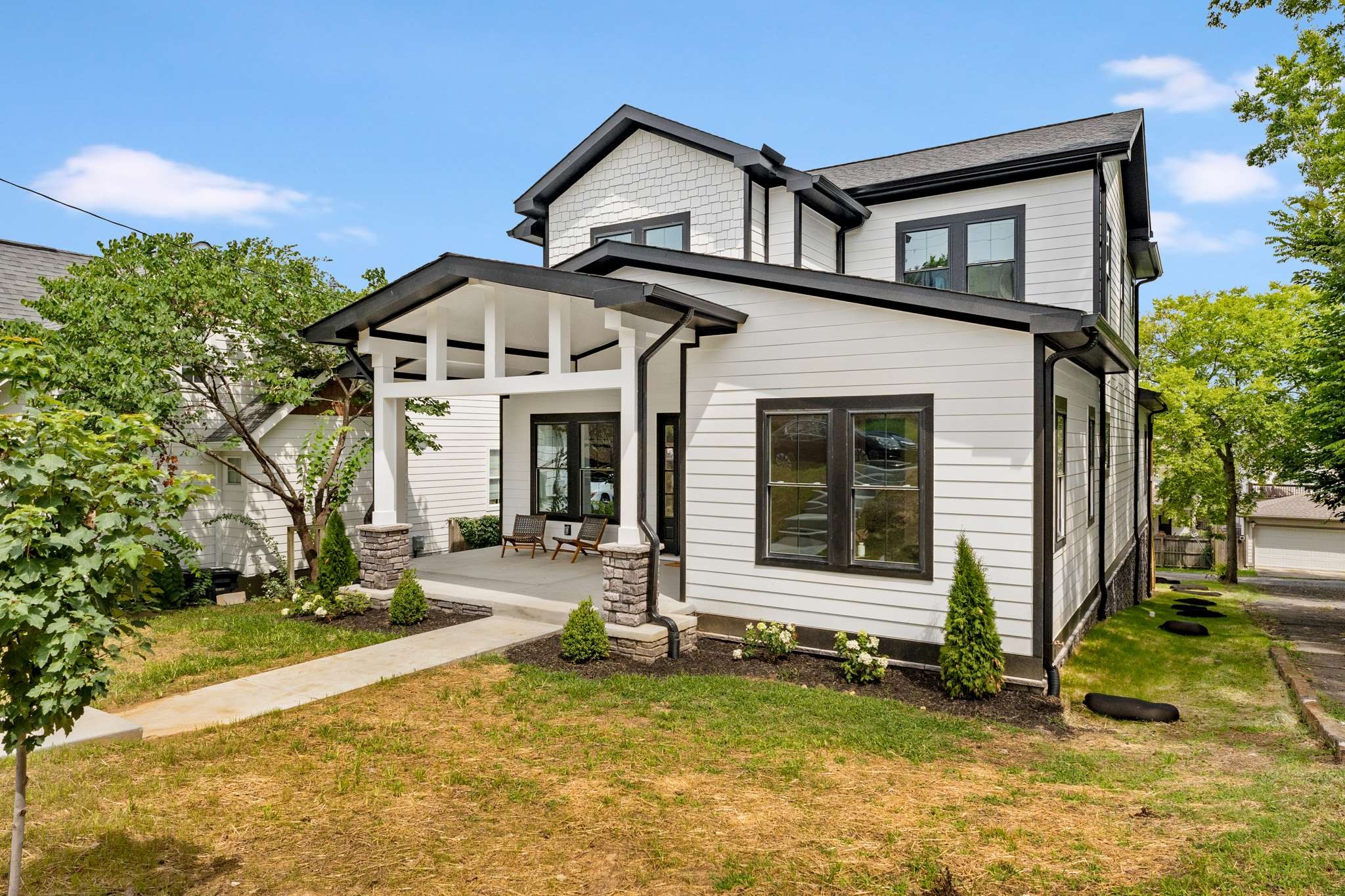 3512 Elkins Avenue Nashville, TN 37209 - Photo 3 of 36 a front view of a house with a yard