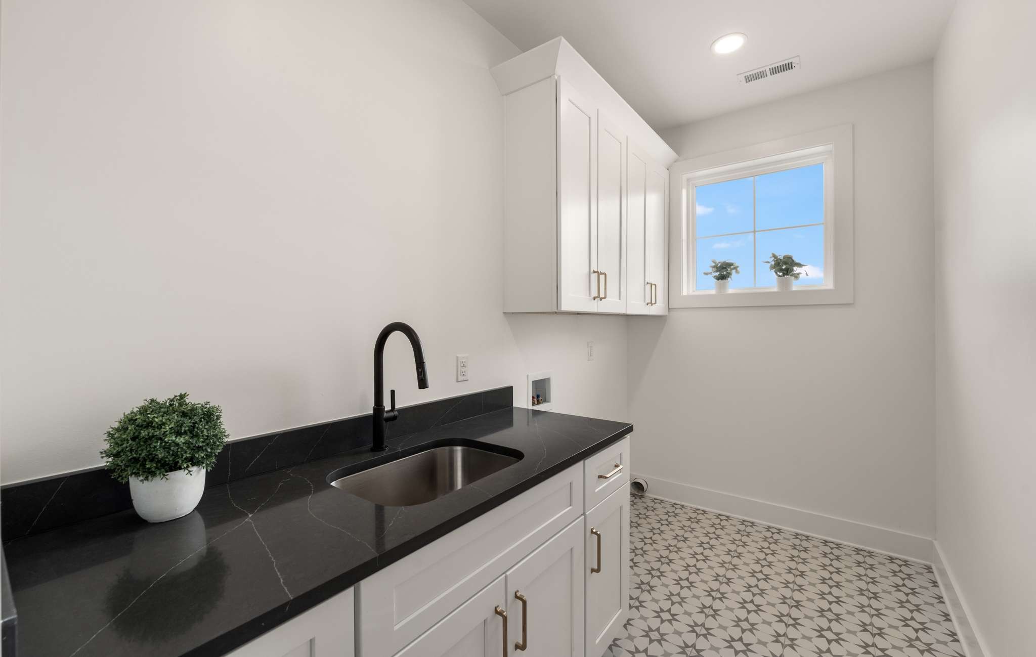 3512 Elkins Avenue Nashville, TN 37209 - Photo 31 of 36 a kitchen with a sink and cabinets