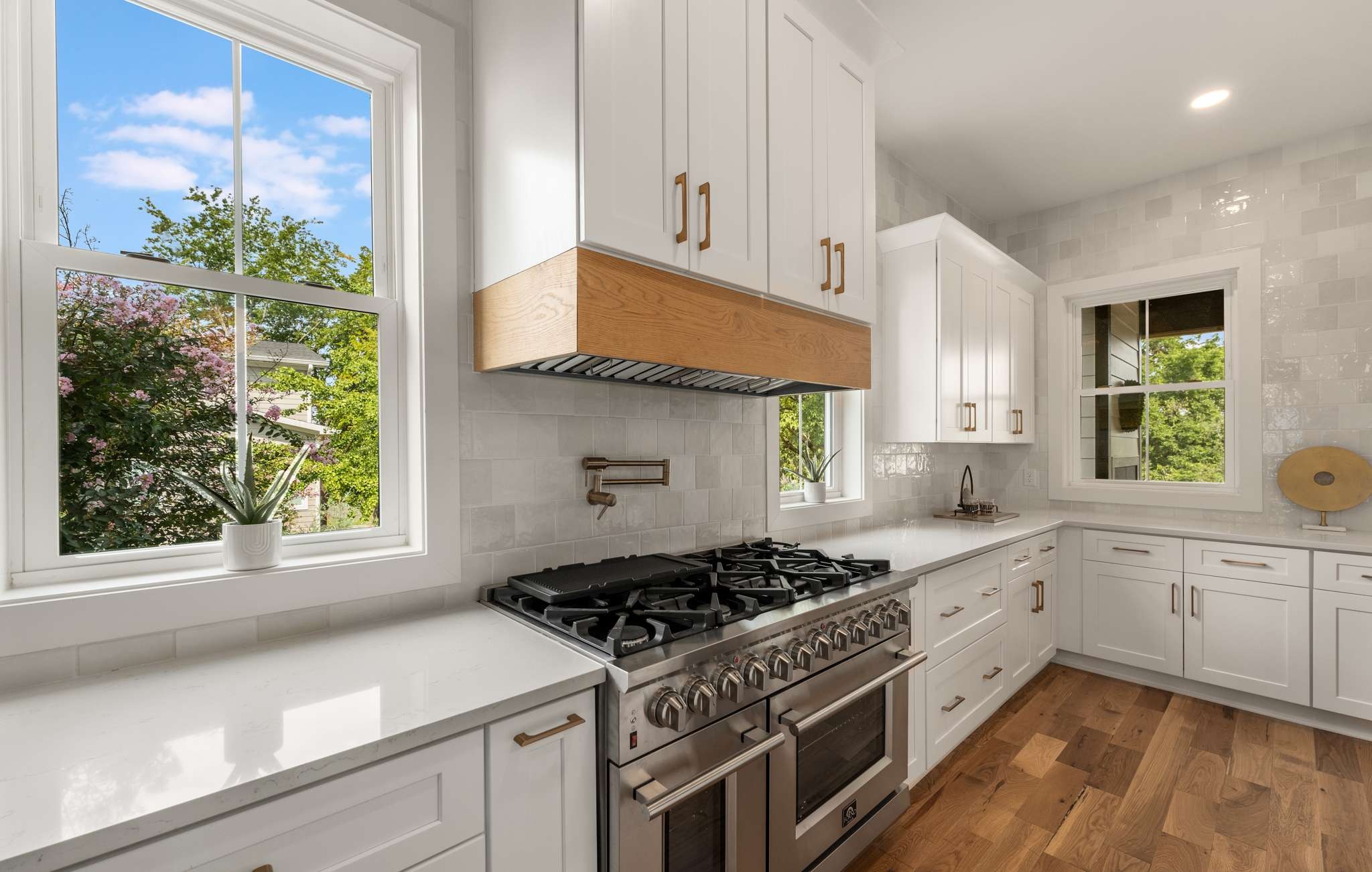 3512 Elkins Avenue Nashville, TN 37209 - Photo 8 of 36 a kitchen with a stove a sink and a window