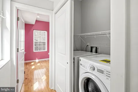 a view of living room with washer and dryer