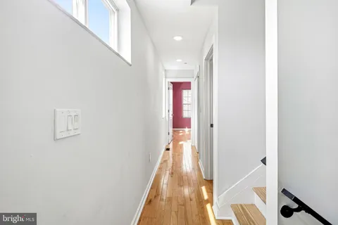 a view of hallway with stairs