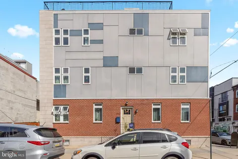 a car parked in front of a building