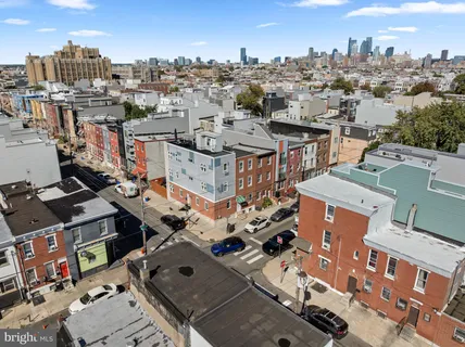 an aerial view of a city with lots of residential buildings
