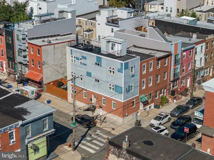 an aerial view of a building with many windows