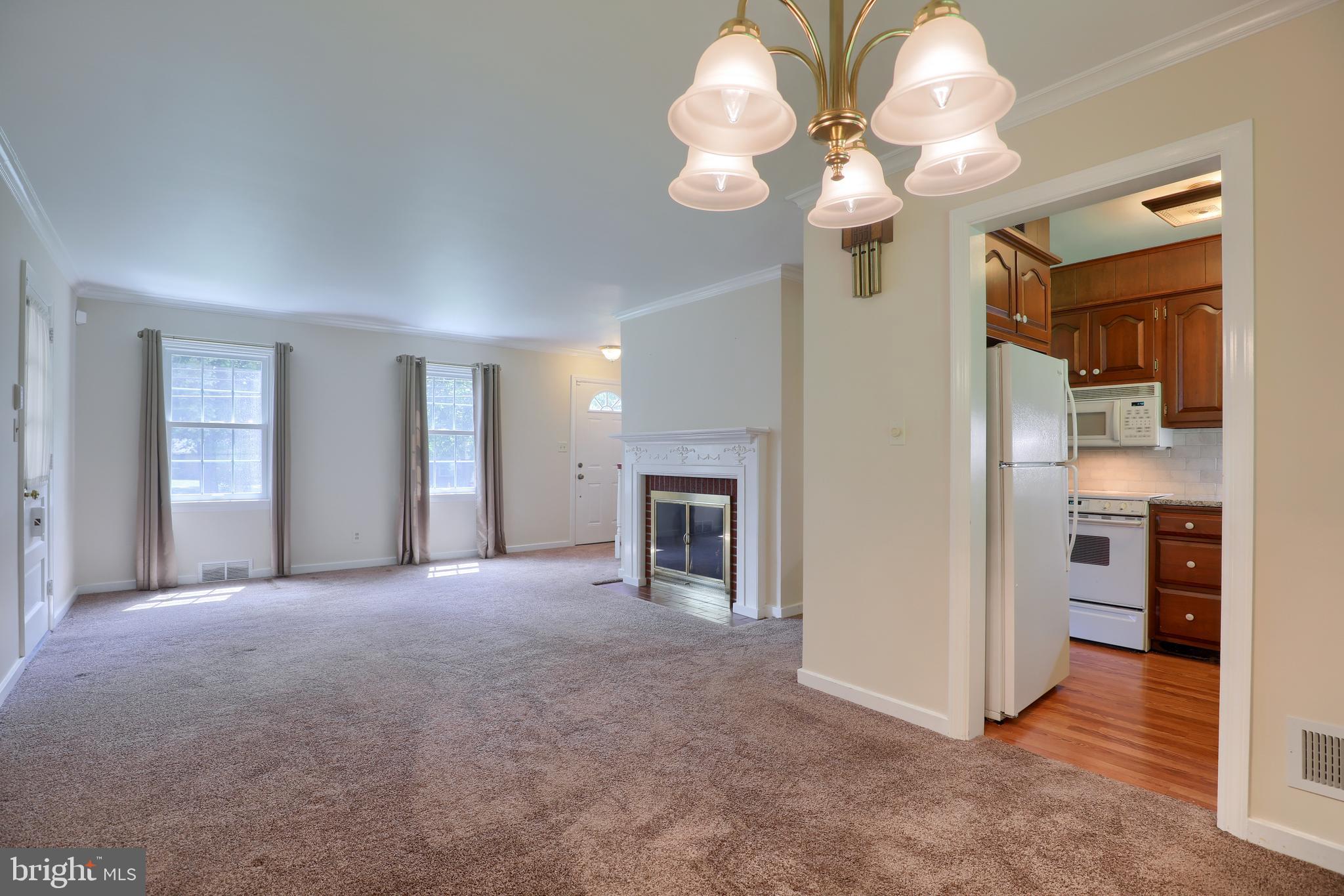 1565 Eden Road Lancaster, PA 17601 - Photo 11 of 33 a view of a livingroom with a chandelier