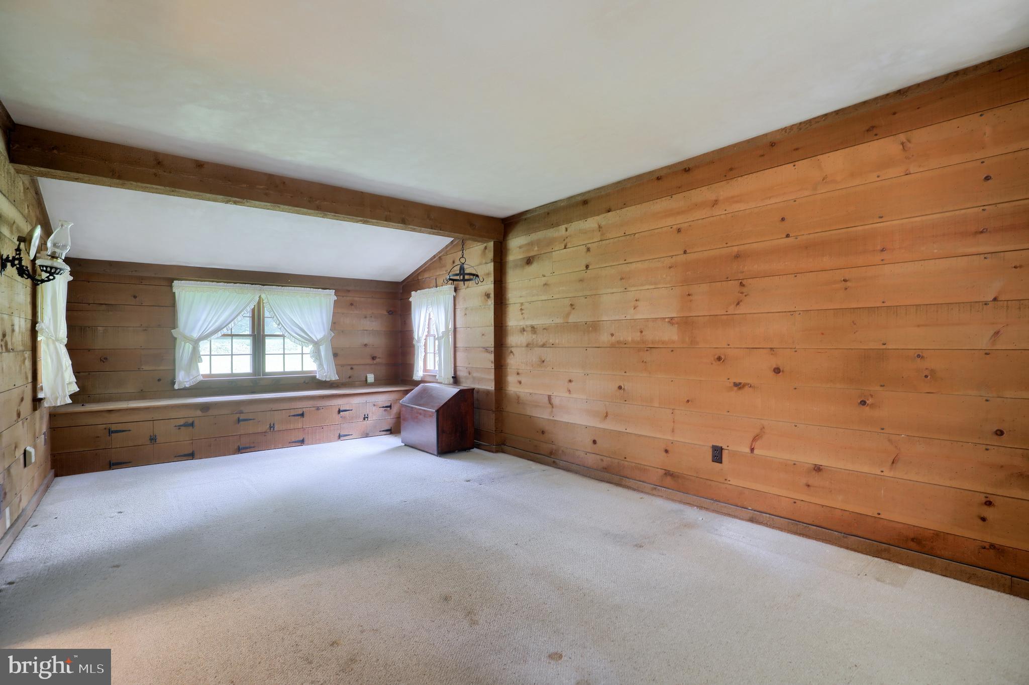 1565 Eden Road Lancaster, PA 17601 - Photo 15 of 33 a view of a livingroom with an empty space and a window