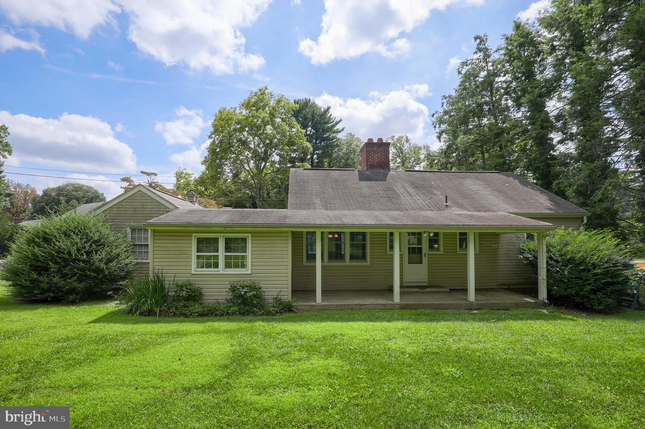 1565 Eden Road Lancaster, PA 17601 - Photo 24 of 33 front view of a house with a garden