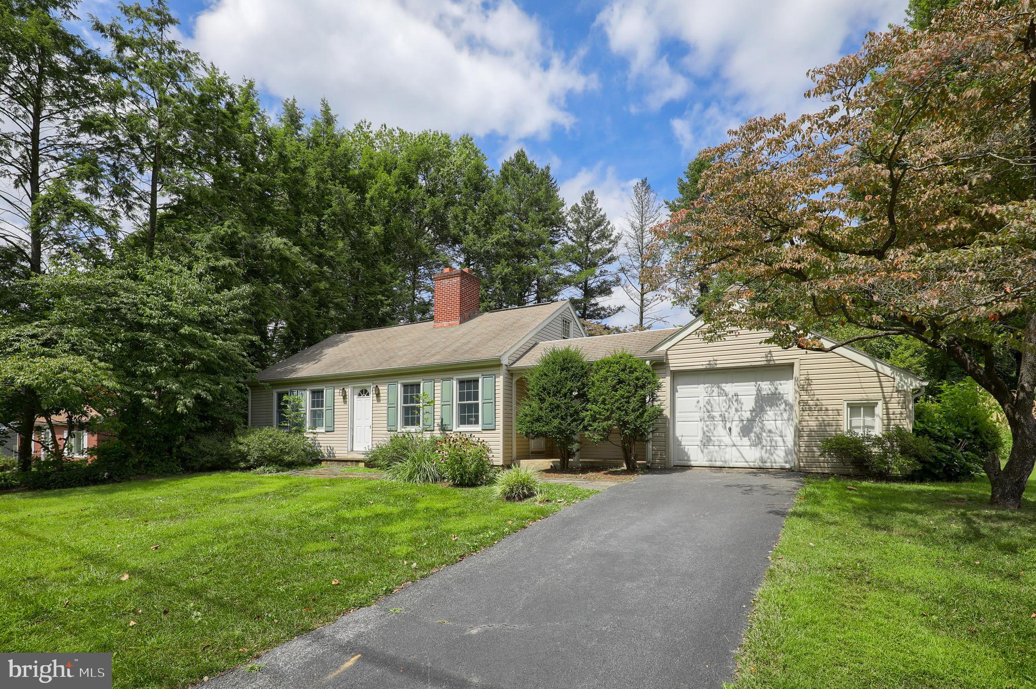 1565 Eden Road Lancaster, PA 17601 - Photo 31 of 33 a front view of a house with a yard and trees