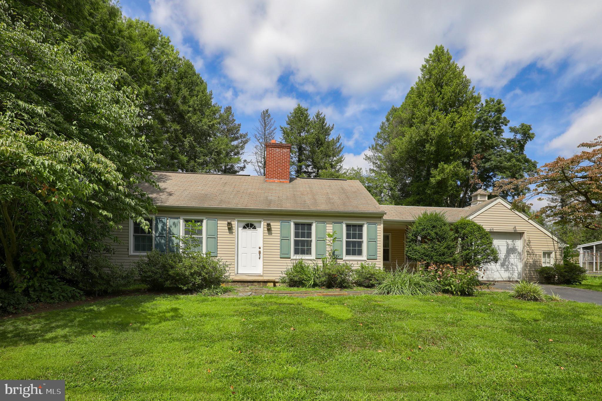 1565 Eden Road Lancaster, PA 17601 - Photo 32 of 33 a front view of a house with a yard