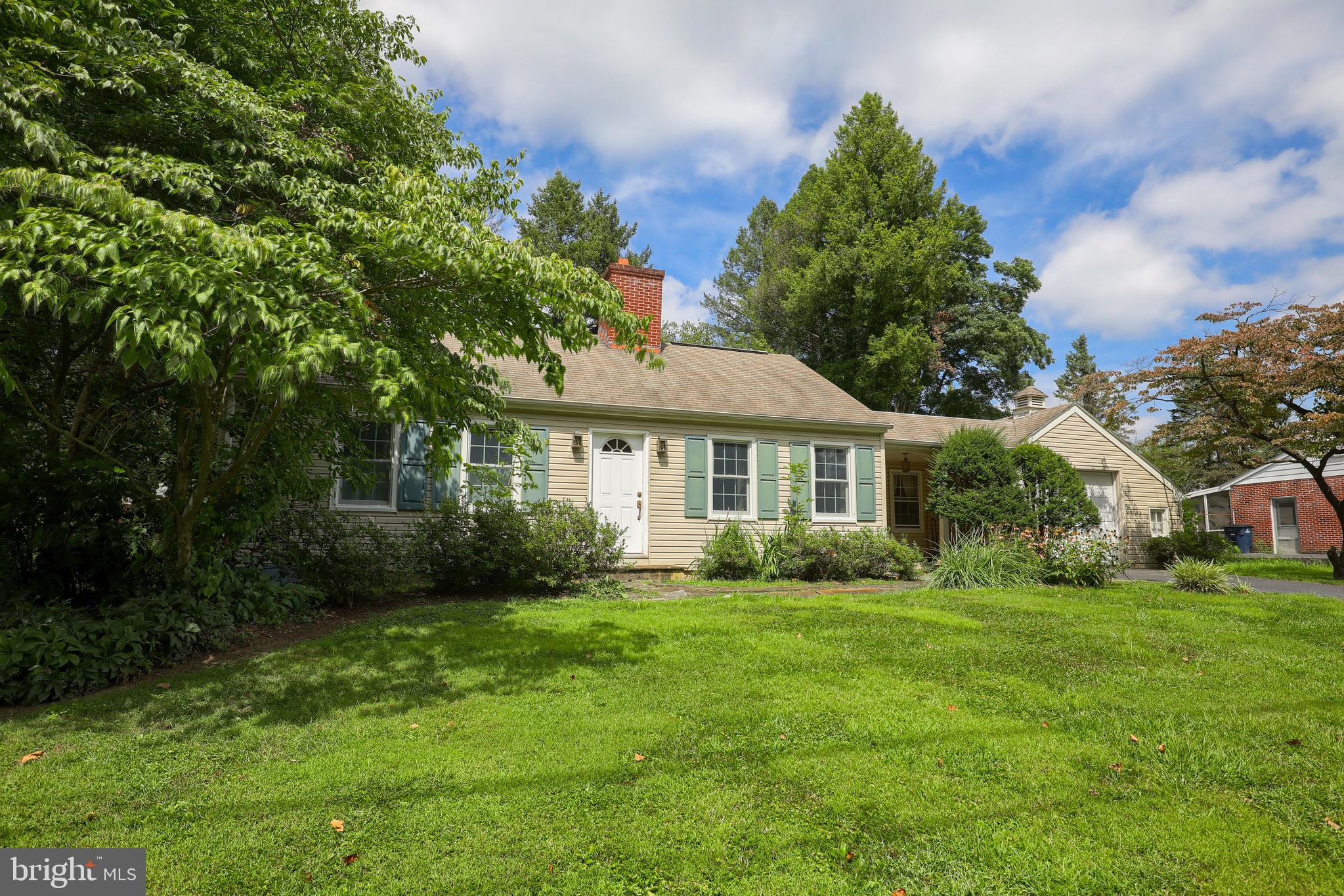 1565 Eden Road Lancaster, PA 17601 - Photo 33 of 33 a front view of a house with garden