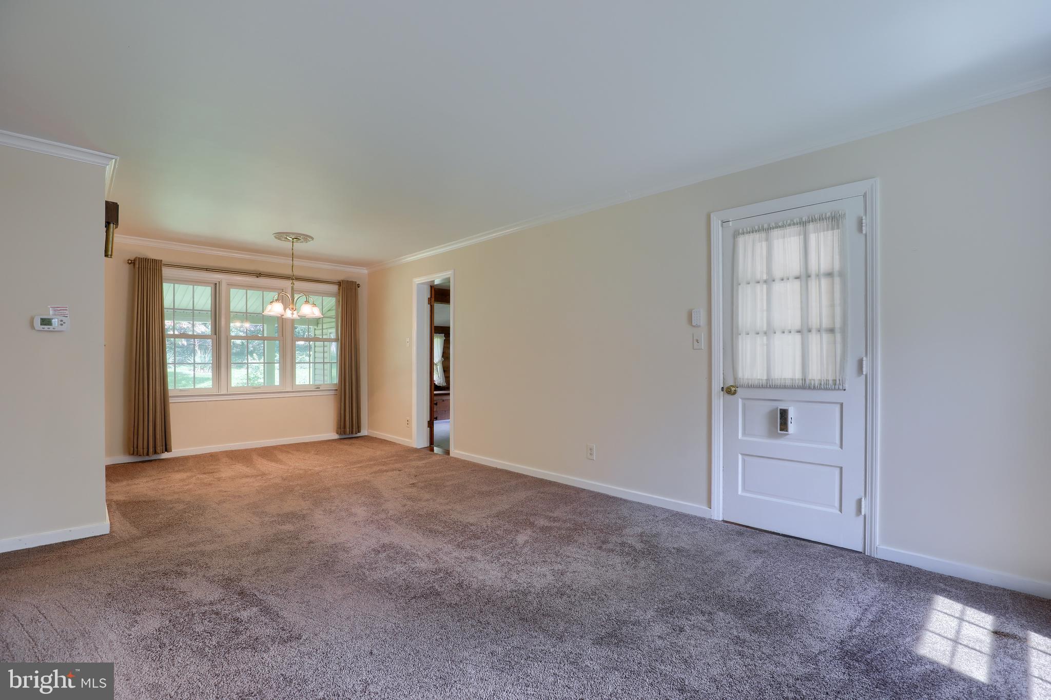 1565 Eden Road Lancaster, PA 17601 - Photo 5 of 33 an empty room with windows and closet