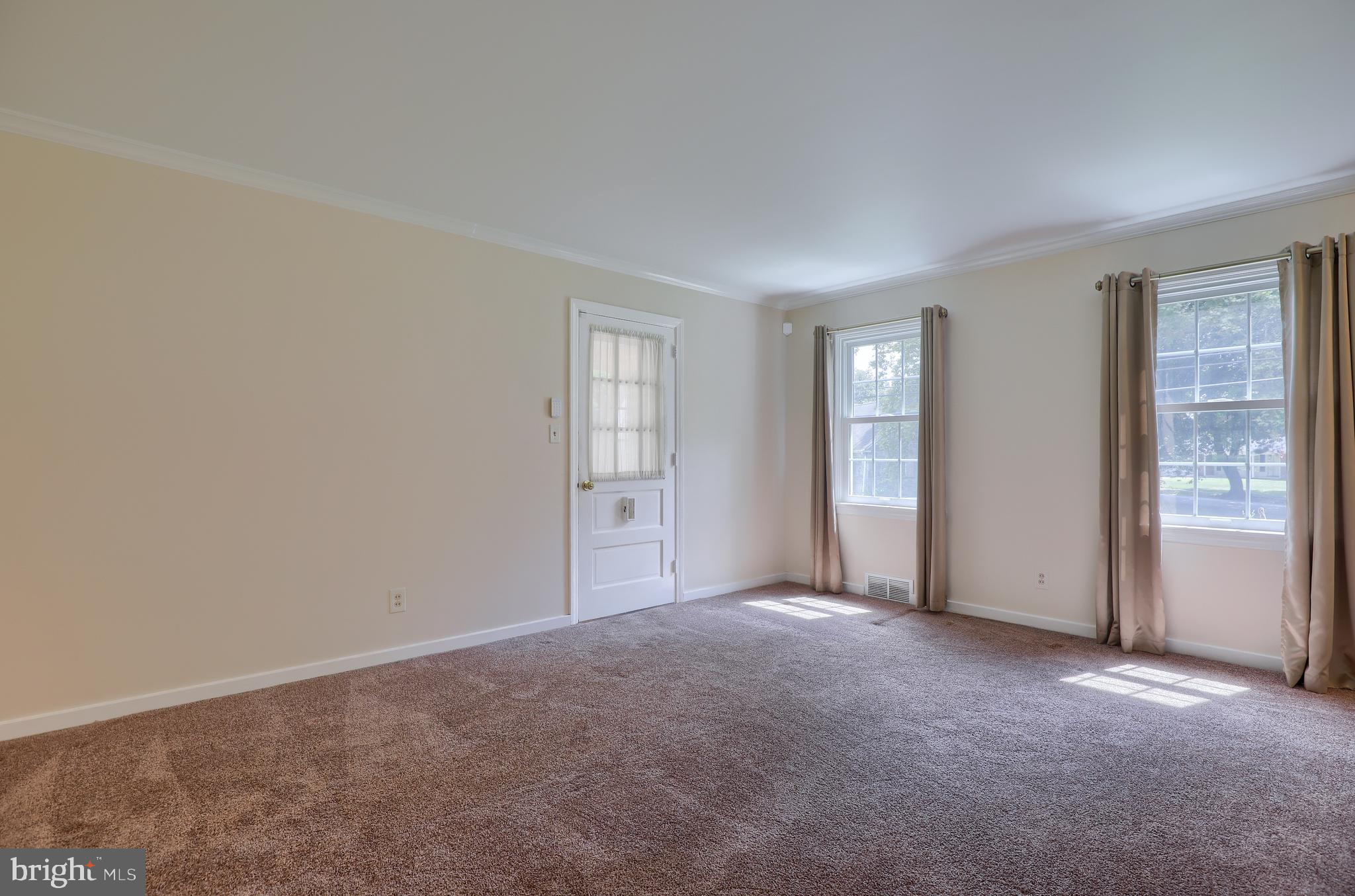 1565 Eden Road Lancaster, PA 17601 - Photo 6 of 33 a view of an empty room with a window