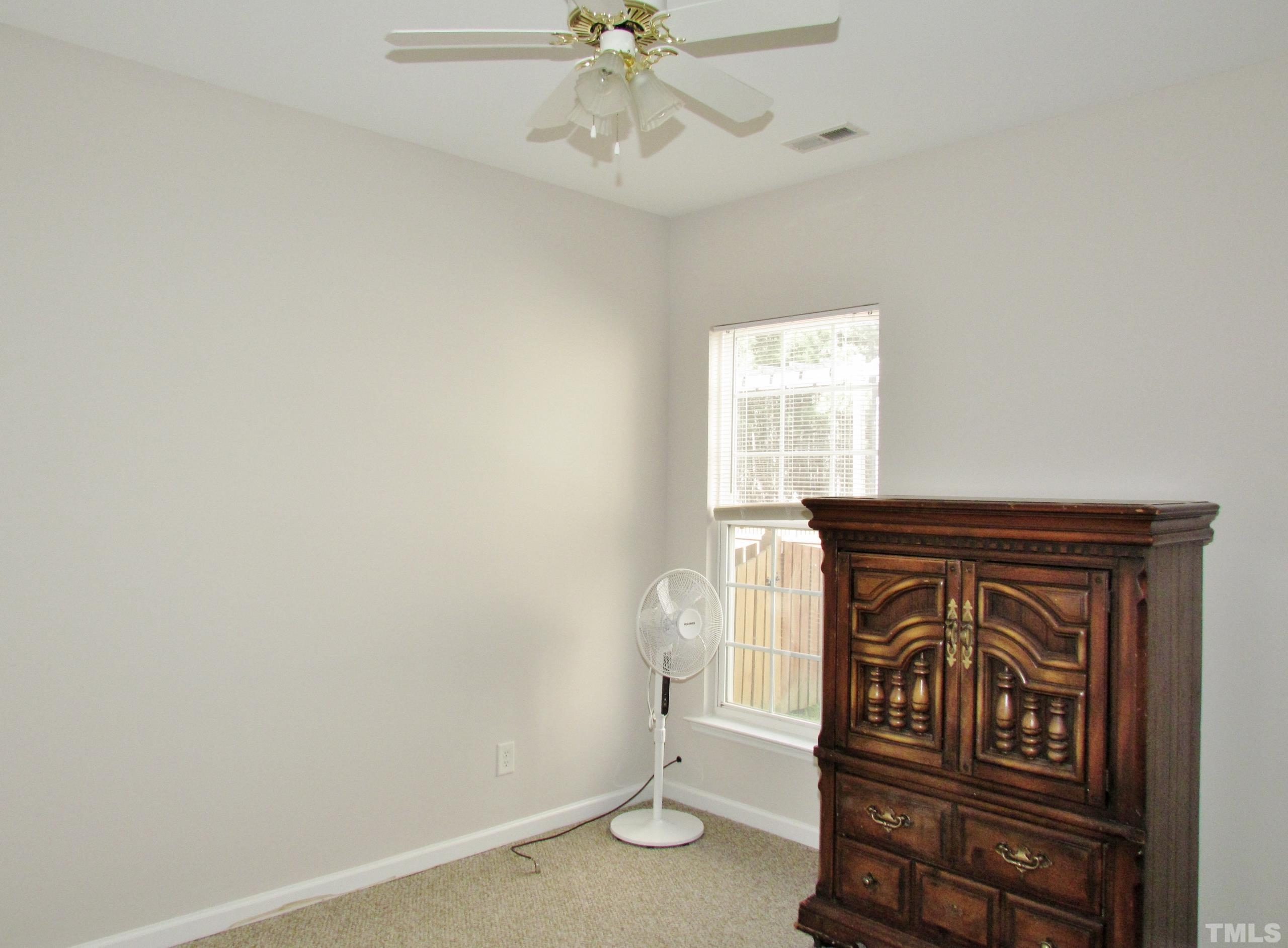 8421 Whisper Ridge Place Raleigh, NC 27613 - Photo 19 of 30 an entryway with a window