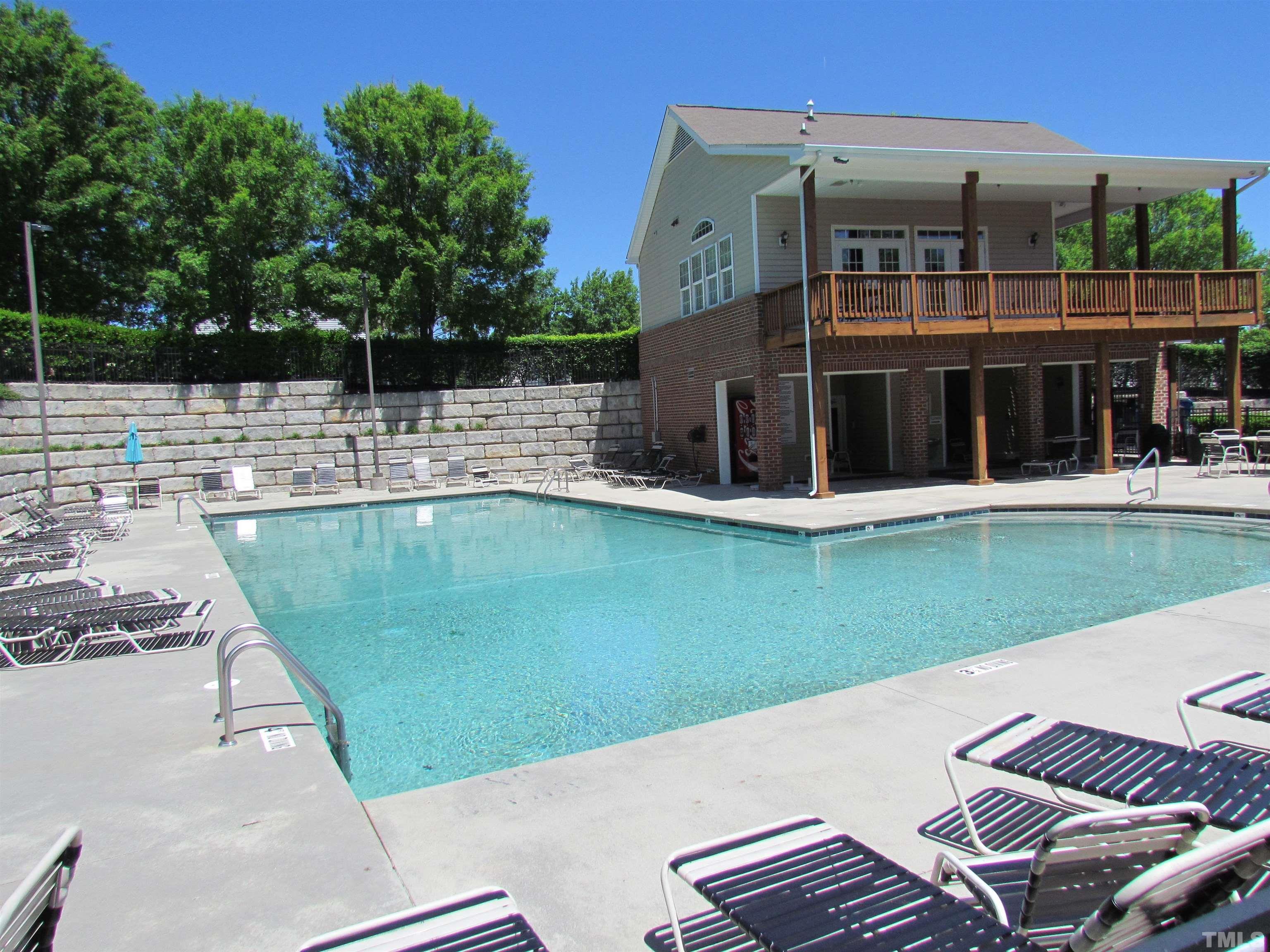 8421 Whisper Ridge Place Raleigh, NC 27613 - Photo 29 of 30 a view of a house with a backyard