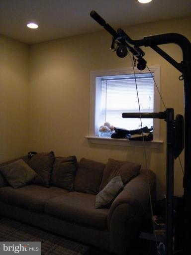 6013 Amherst Avenue Springfield, VA 22150 - Photo 5 of 11 a living room with furniture and a window