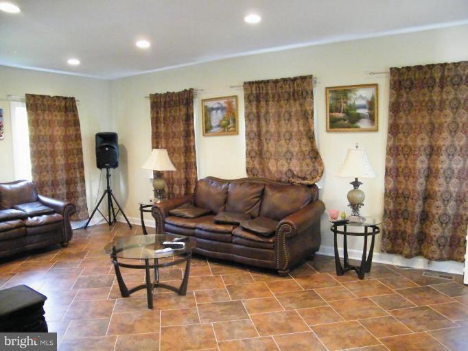 6013 Amherst Avenue Springfield, VA 22150 - Photo 7 of 11 a living room with furniture and wooden floor