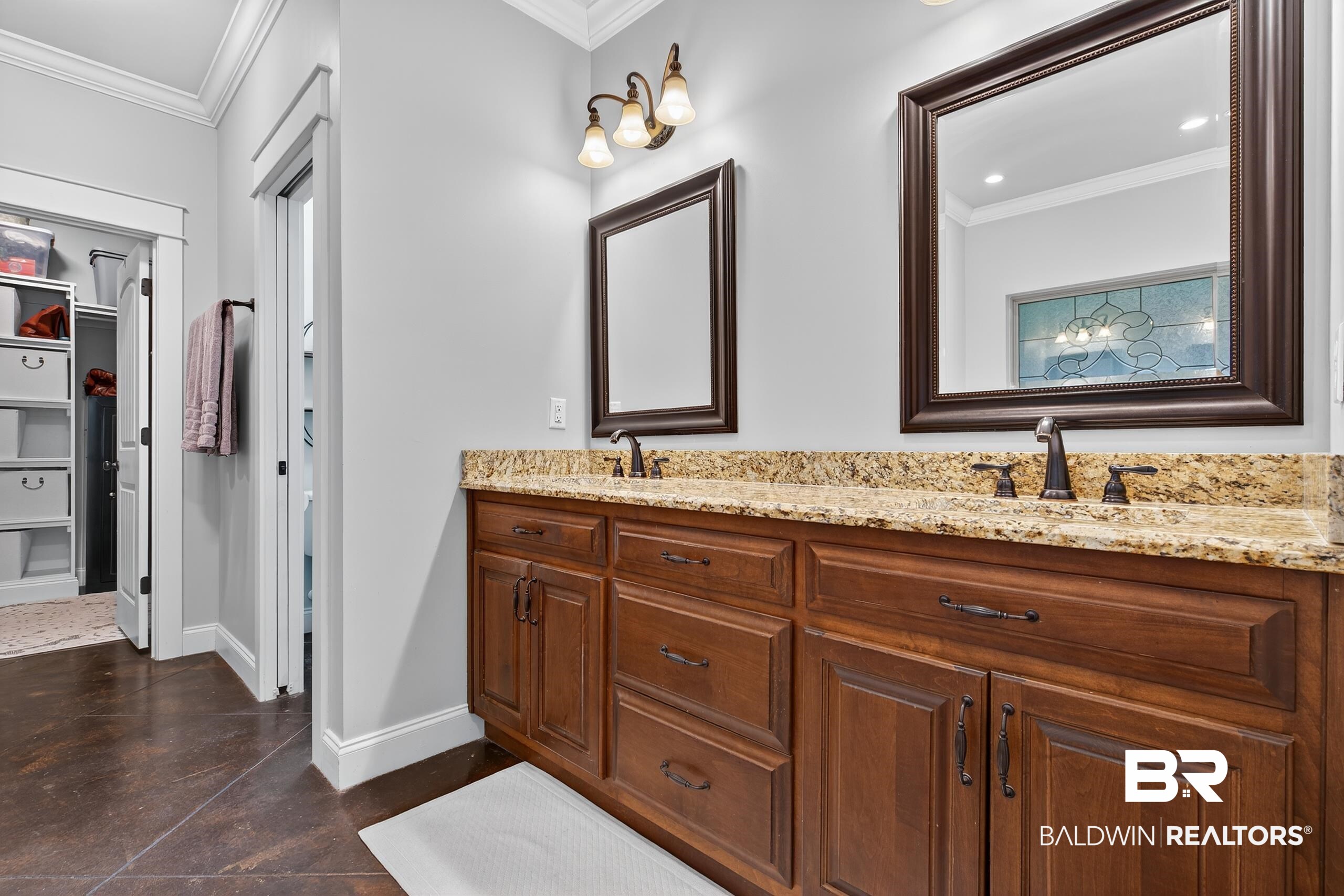 5517 Rabbit Creek Drive Theodore, AL 36582 - Photo 16 of 33 Bathroom featuring ornamental molding, a spacious closet, and double vanity