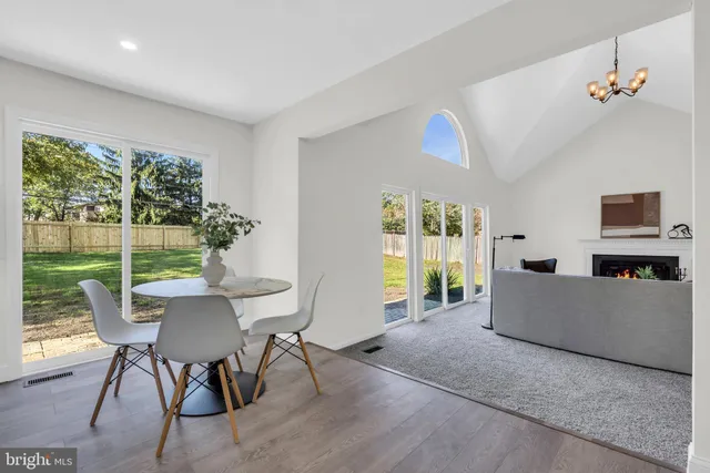 a view of a hallway with wooden shelves